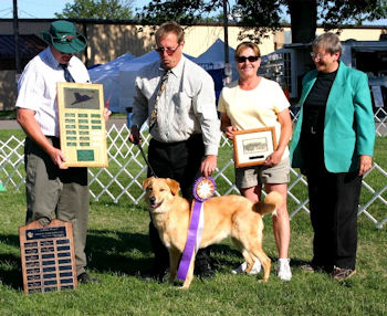 Finnigan standing, and behind him from left to 
right, the Honorable Judge Patrick O'Connell, Dave Schiller, Karen Schiller 
and Joyce Maley